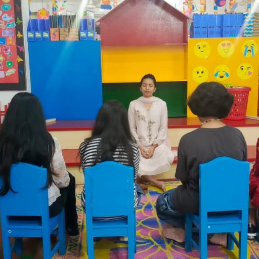 Our Founder, Farzana Kashfi, leading students and teachers through meditation